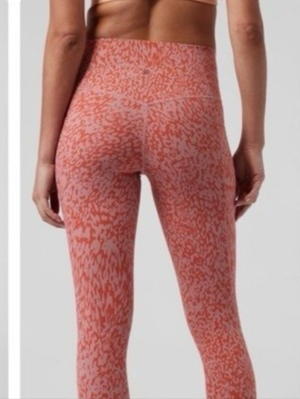 Athleta Salutation Stash Pocket Printed Crop Tights Ocelot Spot Orange size m